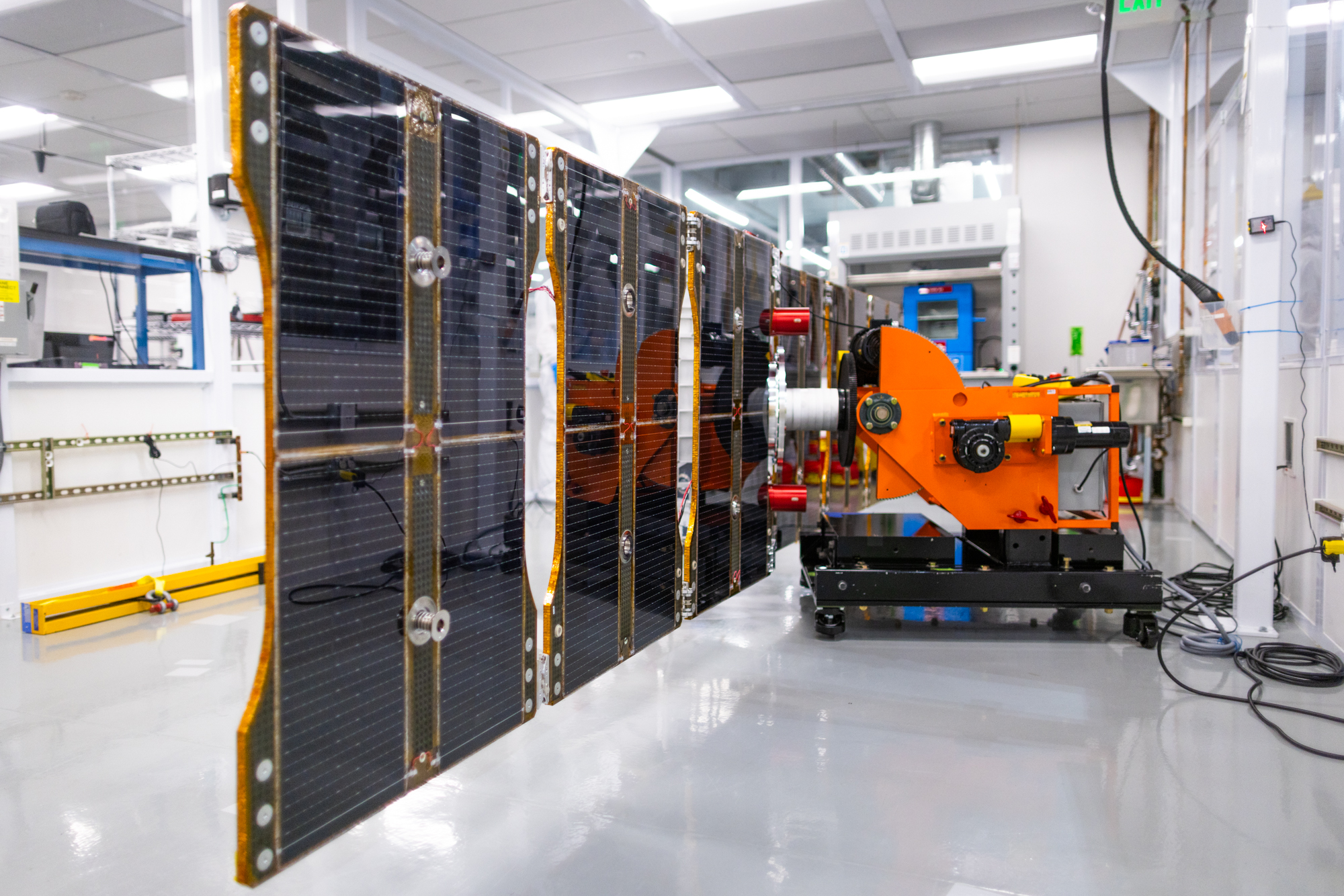Satellite solar panel array in laboratory testing facility